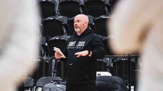 Saint Louis Billikens HC Josh Schertz runs a drill at practice in Chaifetz Arena