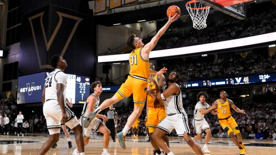 Missouri Tigers guard Caleb Grill (31) scores a layup against the Vanderbilt Commodores during the second half at Memorial Gymnasium in Nashville, Tennessee, on March 1, 2025. Missouri Tigers guard Caleb Grill (31) scores a layup against the Vanderbilt Commodores during the second half at Memorial Gymnasium in Nashville, Tennessee, on March 1, 2025.